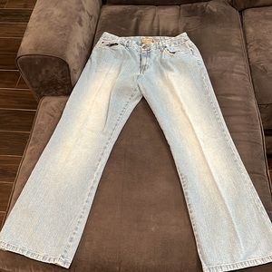 i.e. relaxed faded jeans. Size 12. Very comfortable. Made in Egypt.